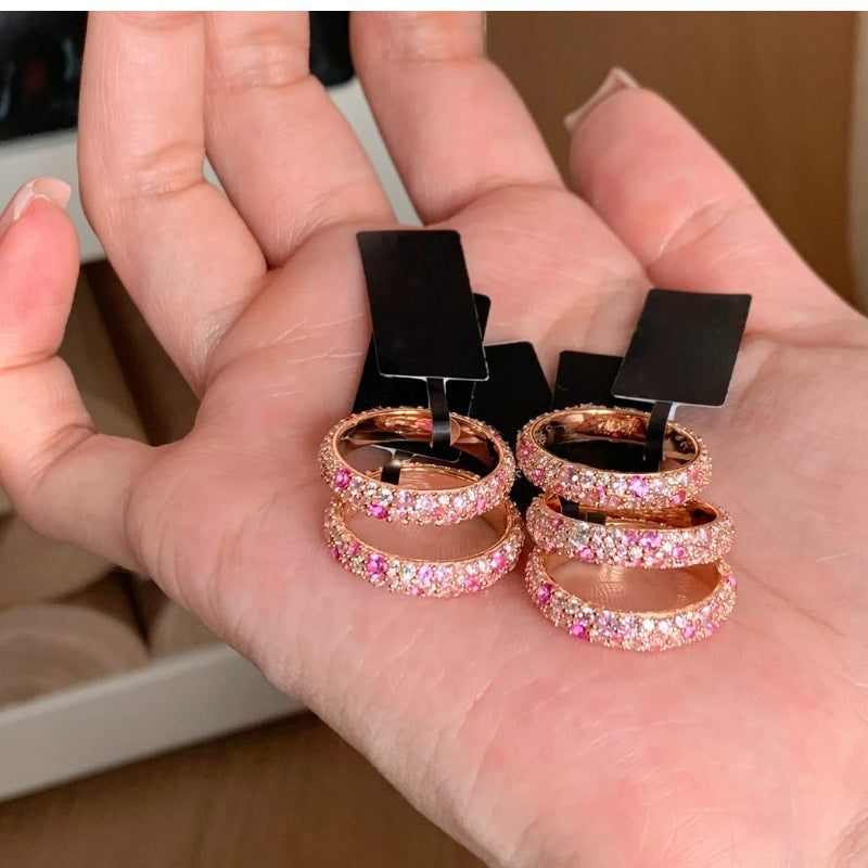 Bague ouverte rose avec détails brillants