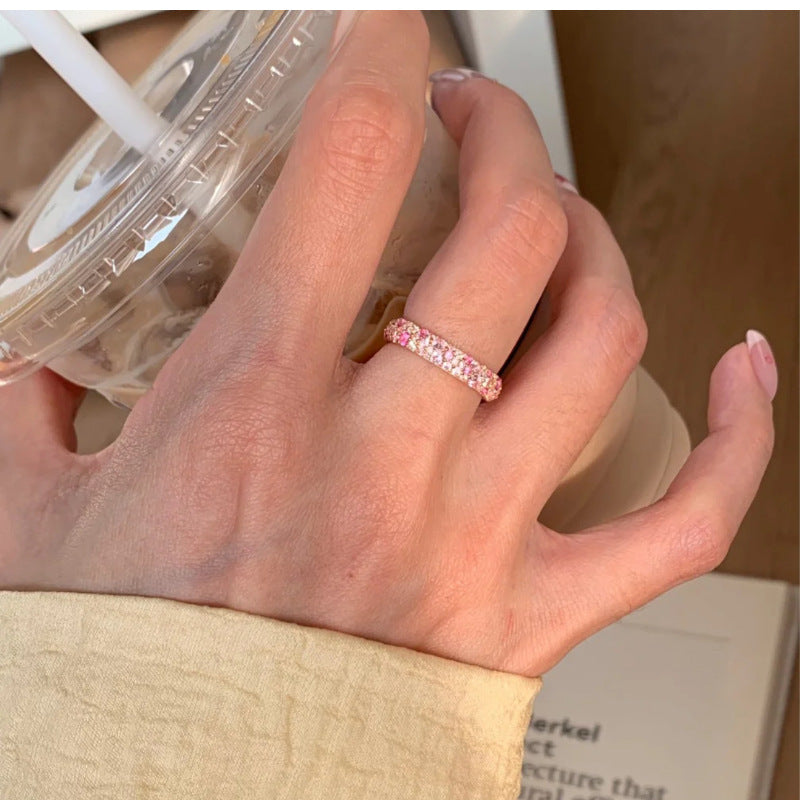 Bague ouverte rose avec détails brillants