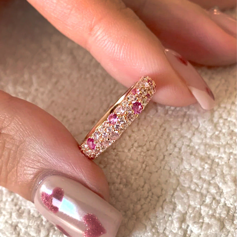 Bague ouverte rose avec détails brillants