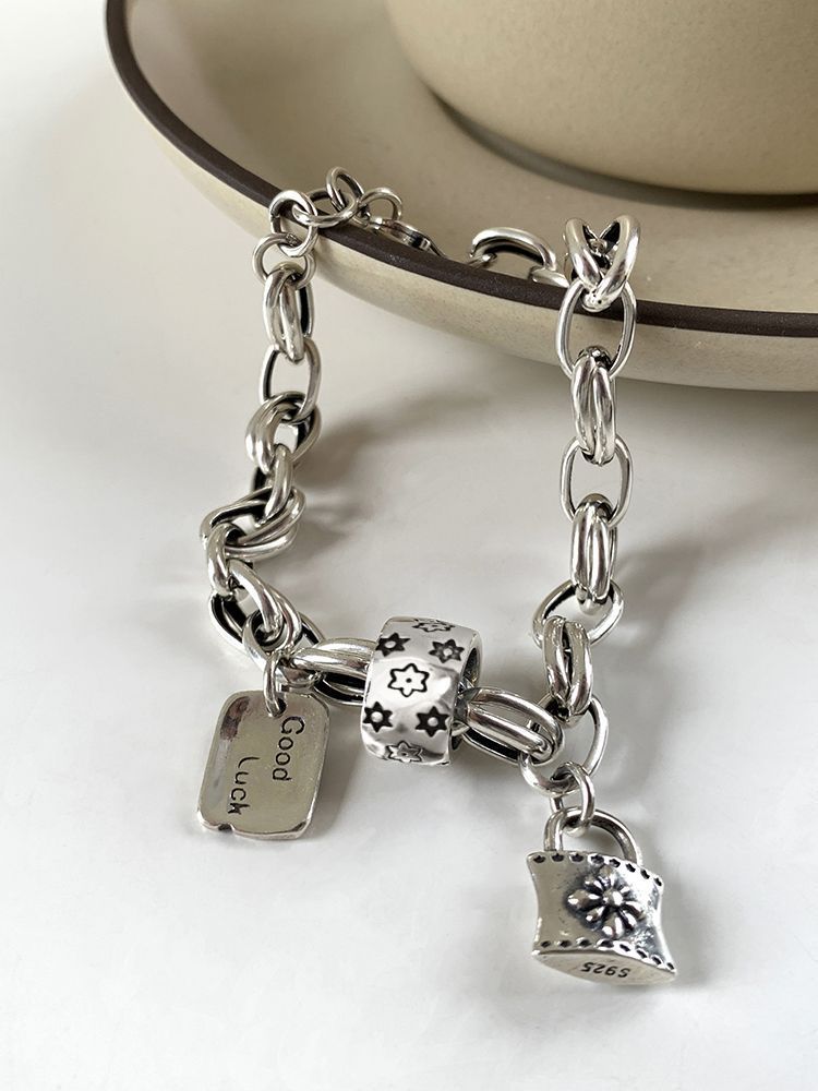 Bracelet vintage avec étoile à six branches