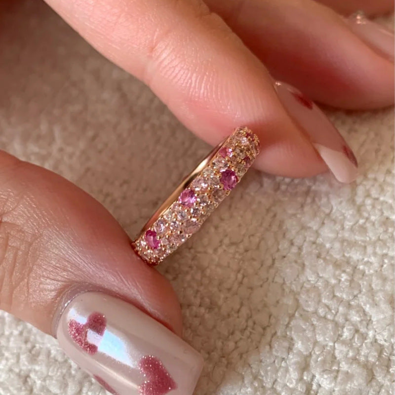 Bague ouverte rose avec détails brillants