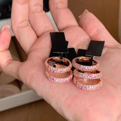 Bague ouverte rose avec détails brillants