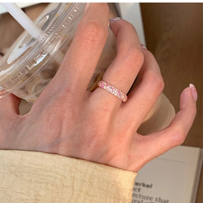 Bague ouverte rose avec détails brillants